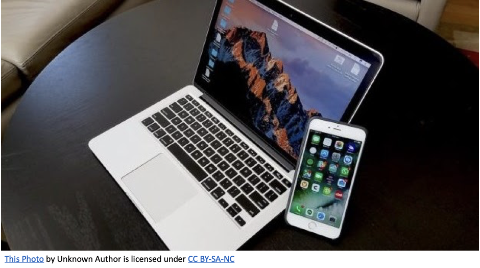 Image of laptop and phone
